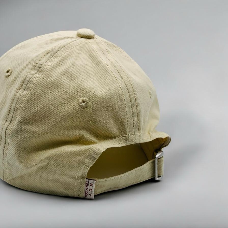 BEIGE BASEBALL CAP WITH MAKE PEACEFUL EMBROIDERY ON FRONT
